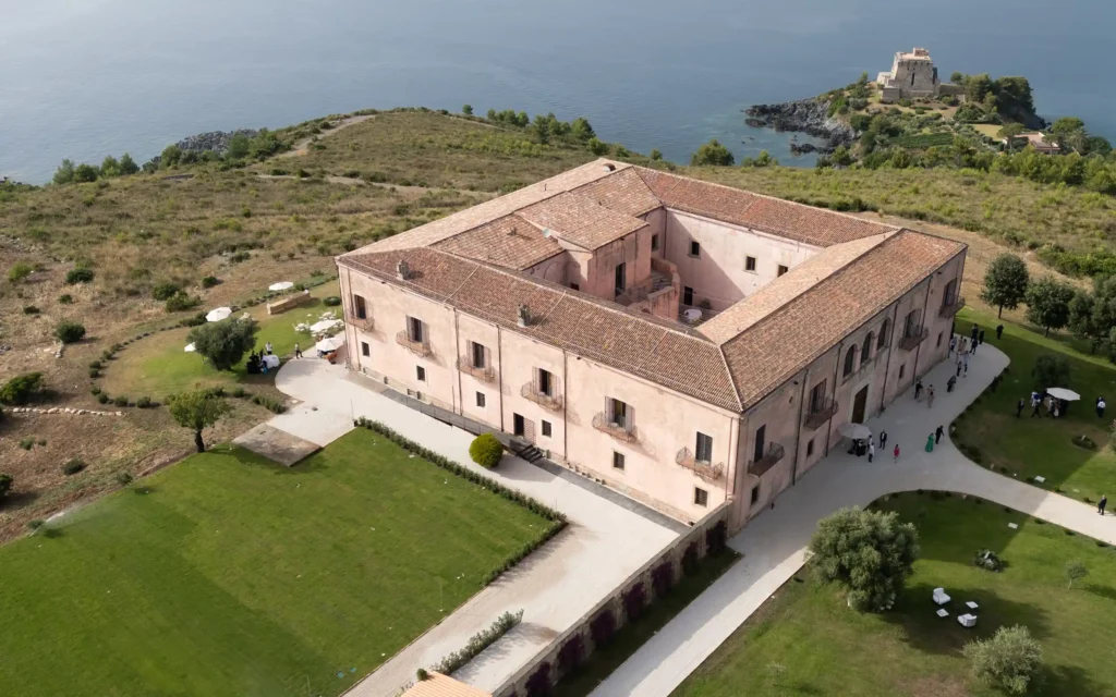 Palazzo Principi Lanza in San Nicola Arcella, a historic mansion with panoramic gardens and sea views.