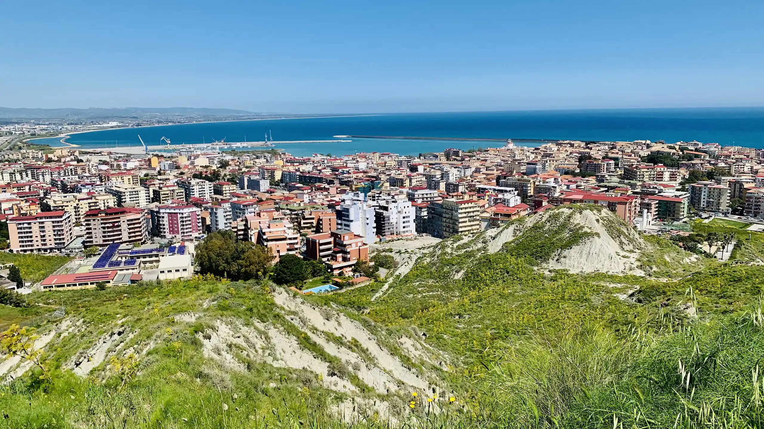Panoramic view of Crotone from Santa Lucia Hill, with the sea and historic center in the distance.