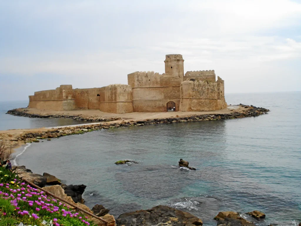 Le Castella Fortress in Isola di Capo Rizzuto, surrounded by crystal-clear waters.